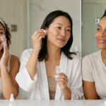 Women with different skin tones following skincare routines suited to their individual skin needs.
